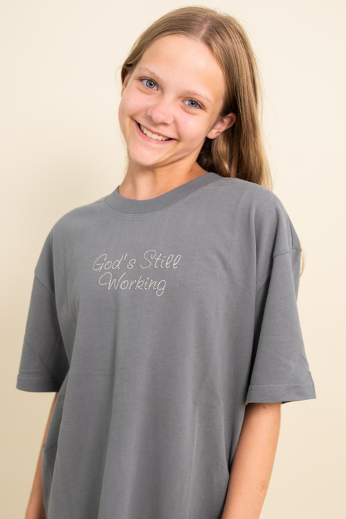 God's Still Working Tee by Elevated Faith