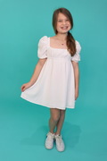 The Presley Babydoll Dress in White by Miss Behave